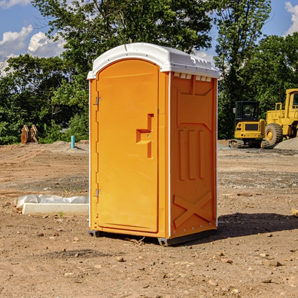 how often are the porta potties cleaned and serviced during a rental period in Mc Lain